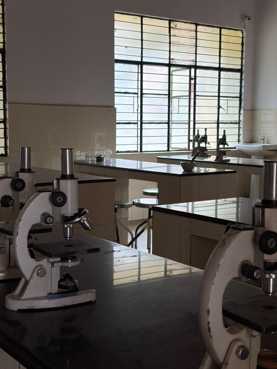 Microscopes set out on the laboratory benches at Mandaara Public School.